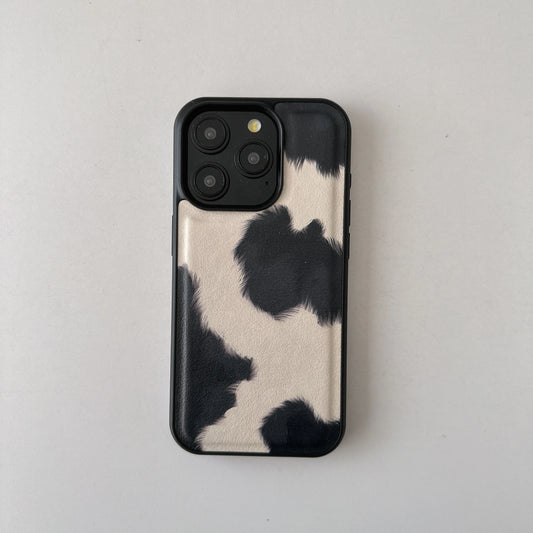 Chic Cow-Pattern Artificial Leather Phone Case for iPhone 16–11 Series
