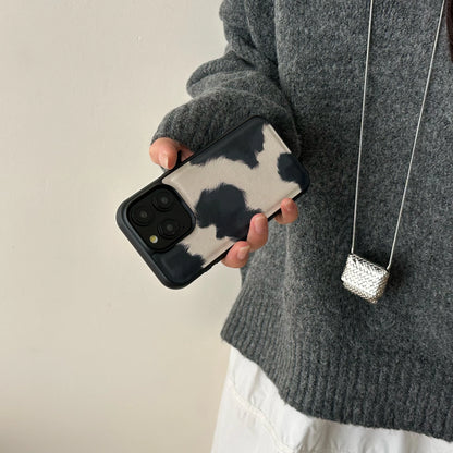 Chic Cow-Pattern Artificial Leather Phone Case for iPhone 16–11 Series